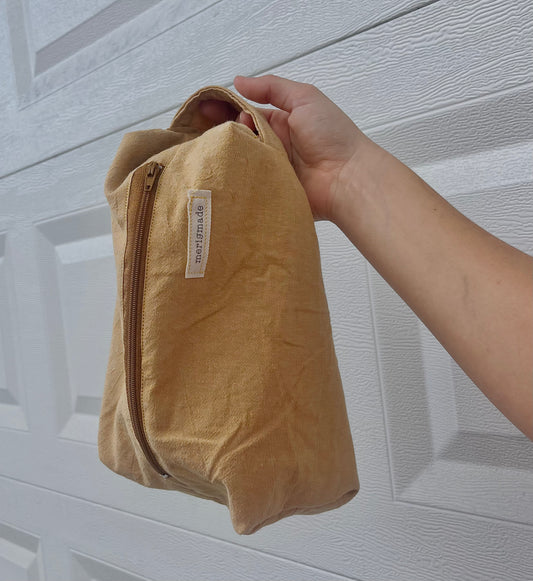 the cosmetic brown zipper