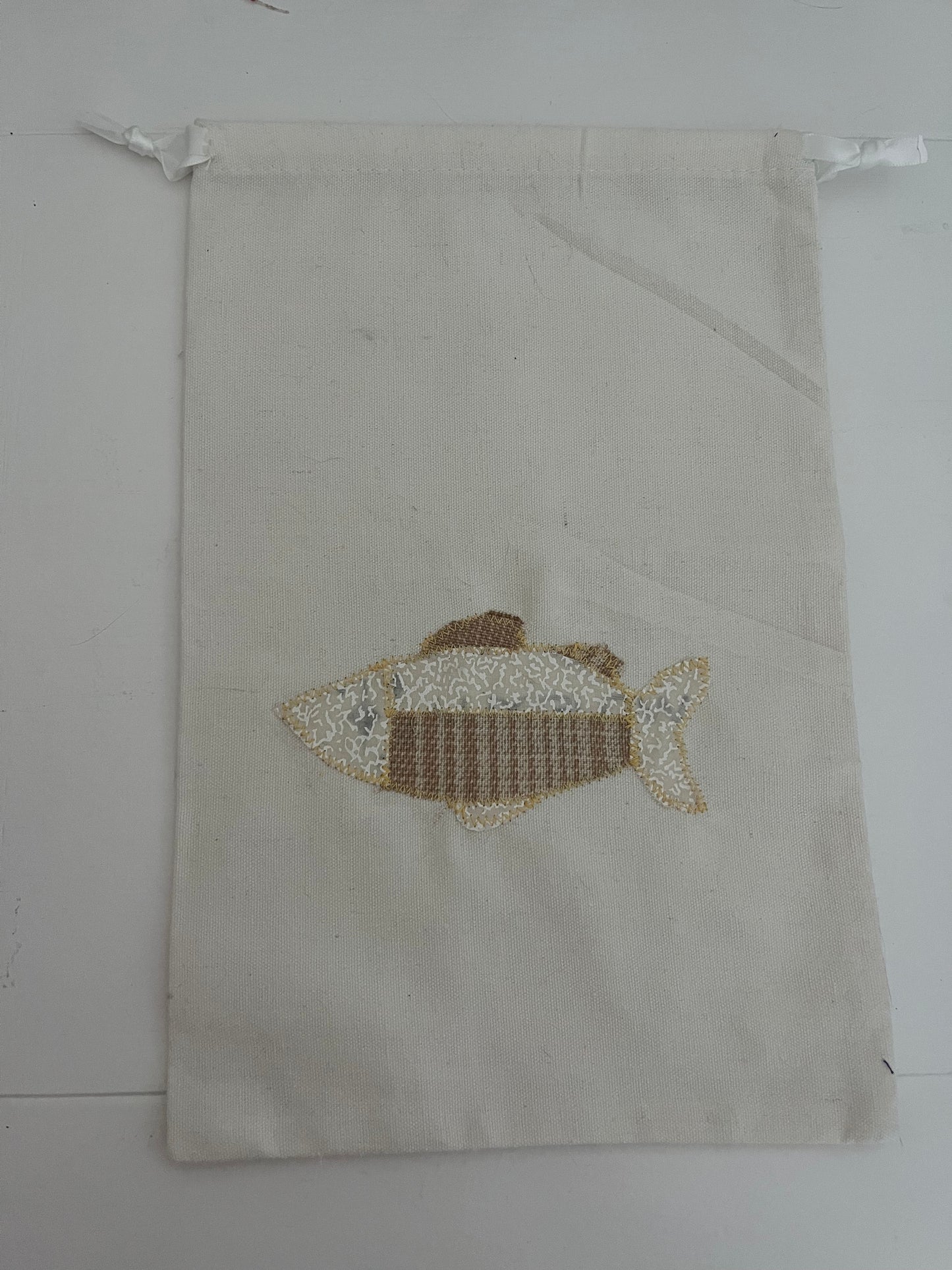 cream fish drawstring bag