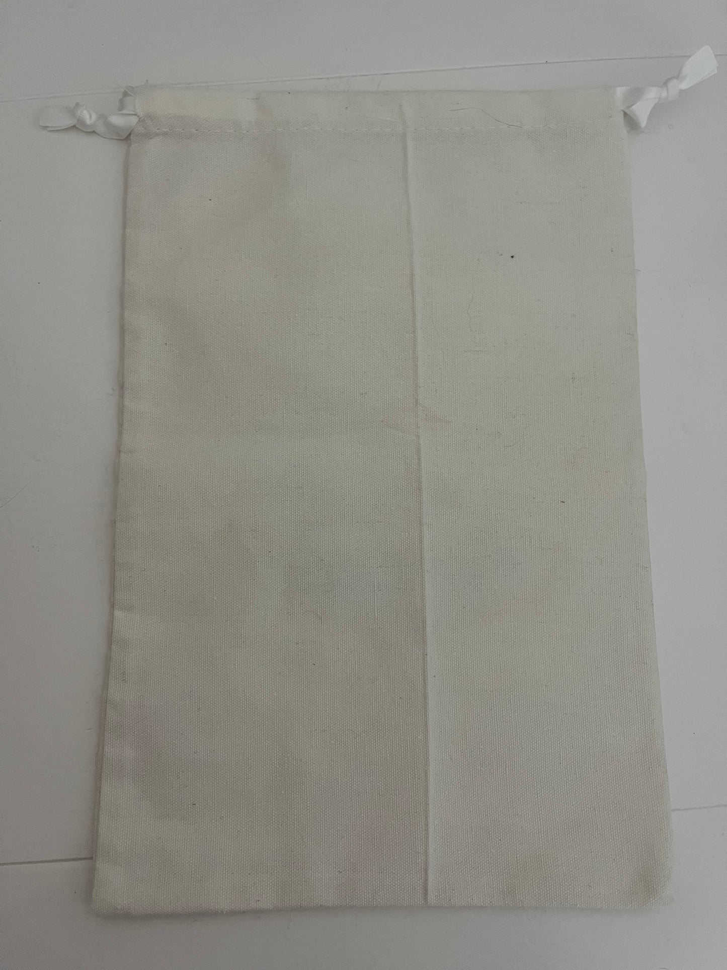 cream fish drawstring bag