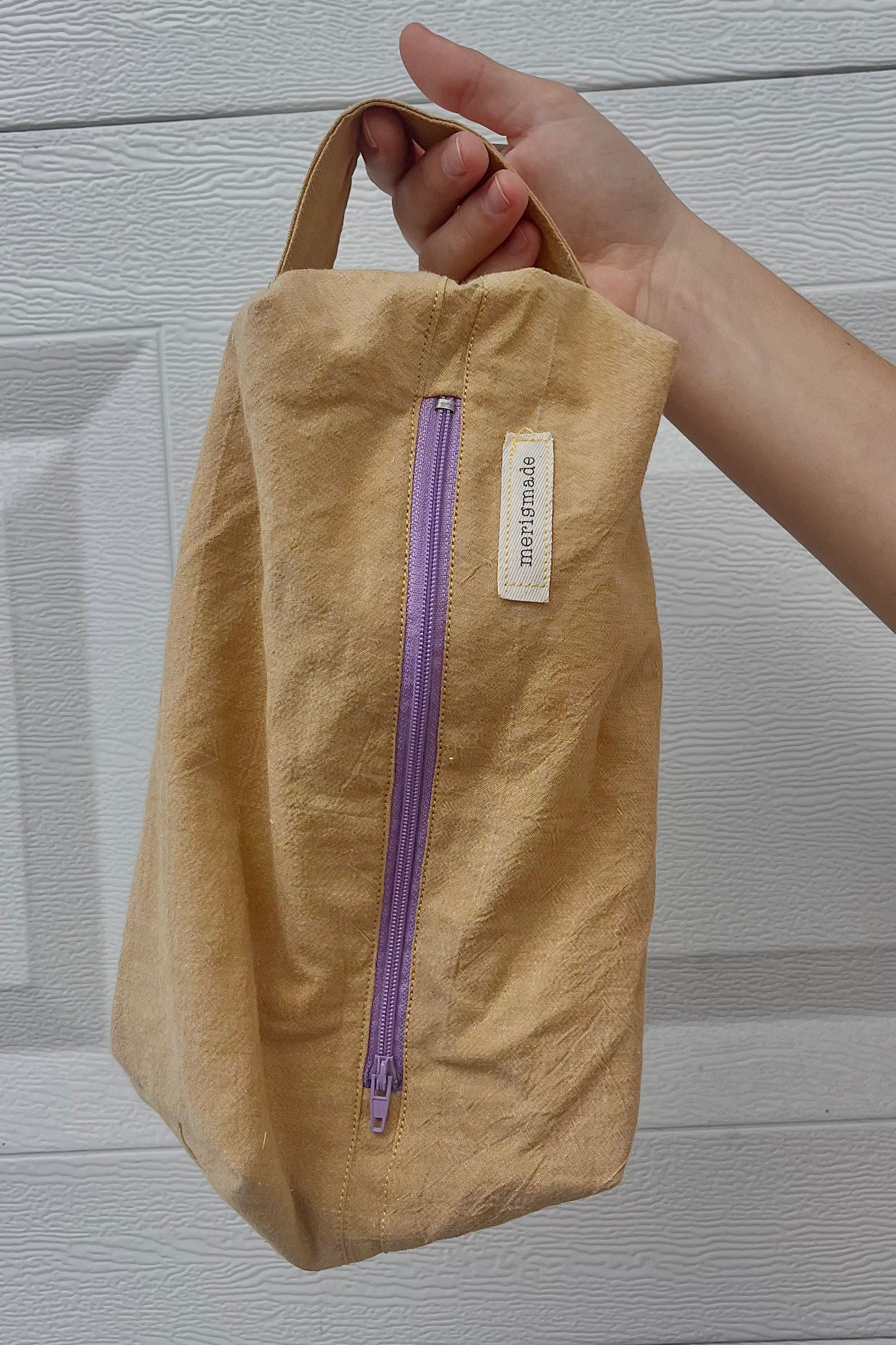 the cosmetic purple zipper