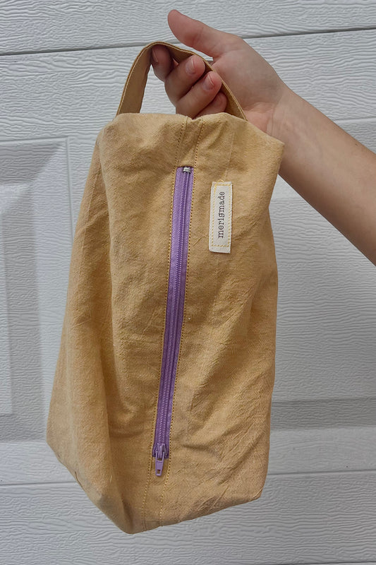 the cosmetic purple zipper